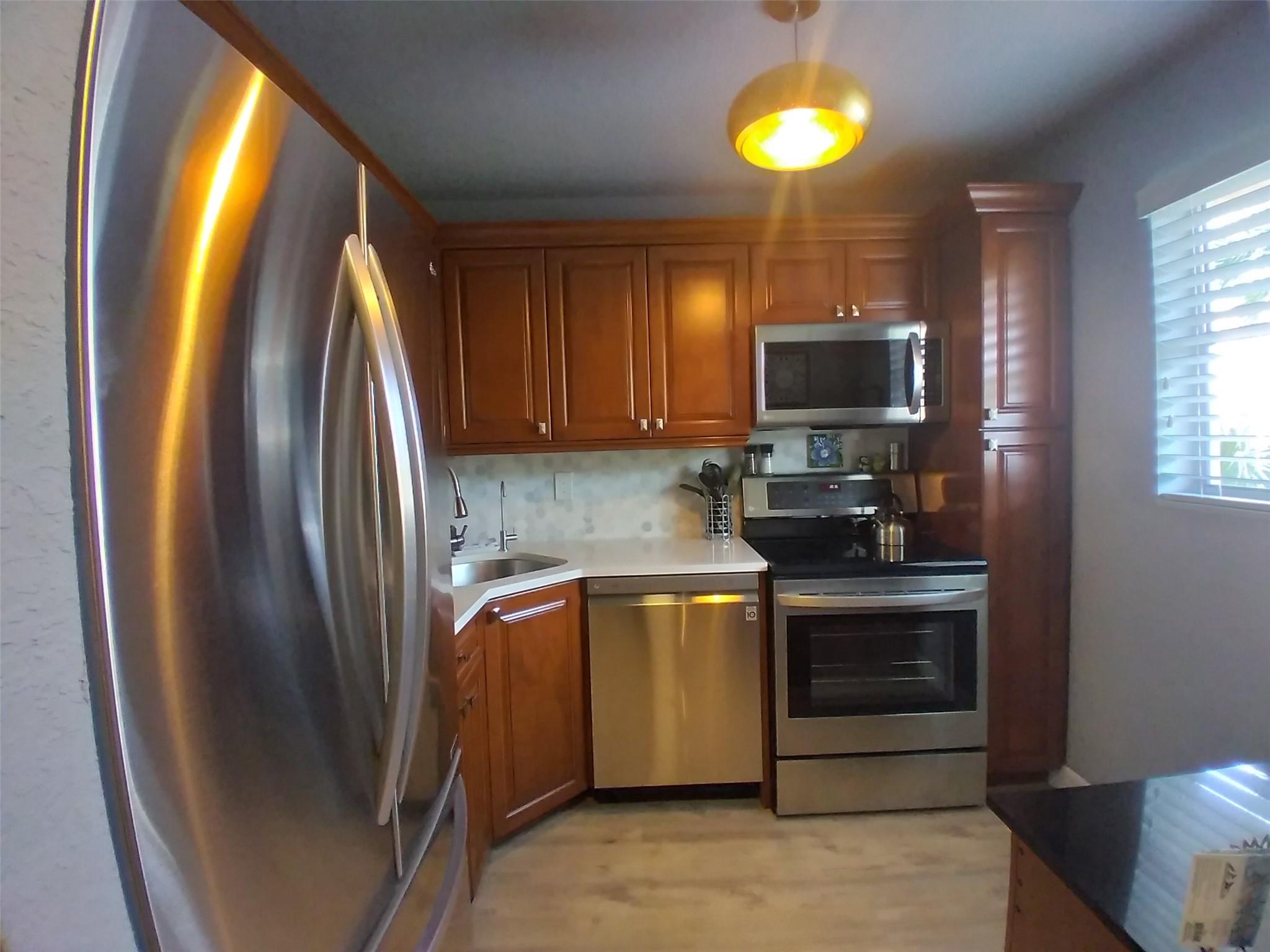 Wow! This beautiful updated, well-maintained, tastefully furnished 2/2 condo is literally turn-key ready! Just bring your clothes and personal belongings, the furniture & all contents are included. This very quiet 55+ community where you know your neighbors is located next to Colony West golf-course. Also close to shopping centers, restaurants, hospital, and parks. One person on the deed must be 55+. This unit has a brand-new AC unit, new hot water heater, brand-new kitchen with SS appliances and Quartz countertop. No leasing or pets. Very low maintenance fee. Amenities: clubhouse, pool, assigned parking space w/ ample guest parking, & extra storage lockers. Maintenance fee includes exterior insurance, water, sewage, trash pick-up, & common areas. Min. income $30K & 650+ credit score.