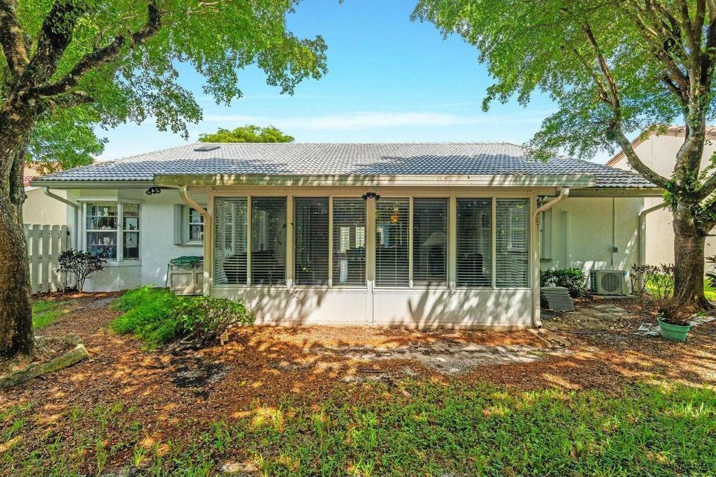 Photo of 8261 Lake Cypress Road, Lake Worth, FL 33467 (MLS # R11137253)