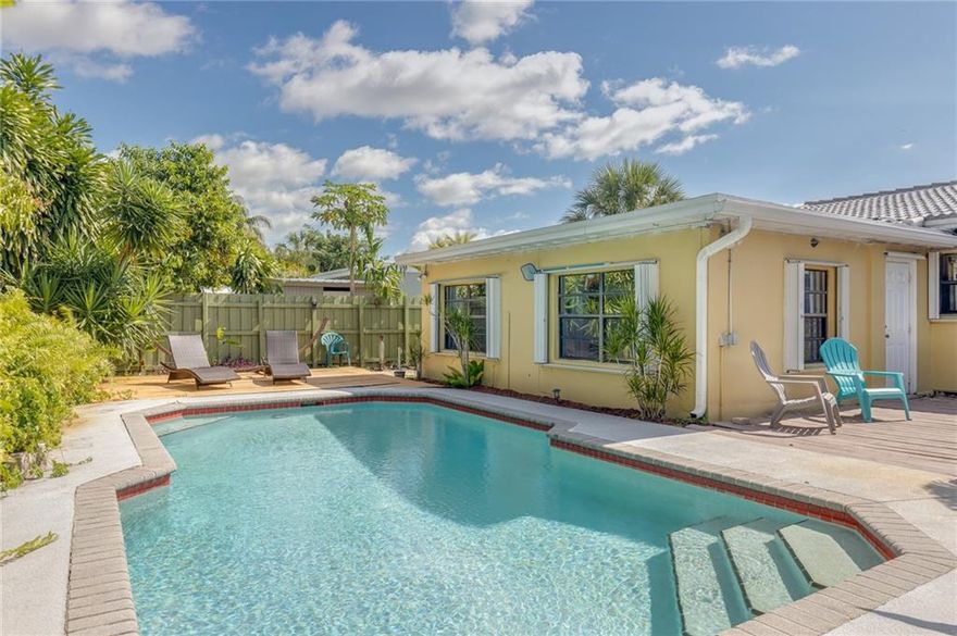 Welcome home to this nicely maintained pool home located conveniently to Wilton Manors, downtown and the beaches. Features include a fully fenced yard with remote controlled & solar powered privacy gate, carport with room for 2 vehicles, well water sprinkler system, stainless steel appliances (2019), new LG wash & dryer w/smart technology (2021), updated electric panel (2020), built-in closet by Closets by Designs in the primary bedroom (2021), mini-split A/C unit in primary bedroom (2020), tile roof replaced (2016) & flat roof replaced (2021), pool pump (2020) and well irrigation pump (2021). The pool area is designed with a double deck and tropical landscaping, perfect for gatherings and relaxation. This is currently the only pool home available in the Ft. Lauderdale area at this price!!