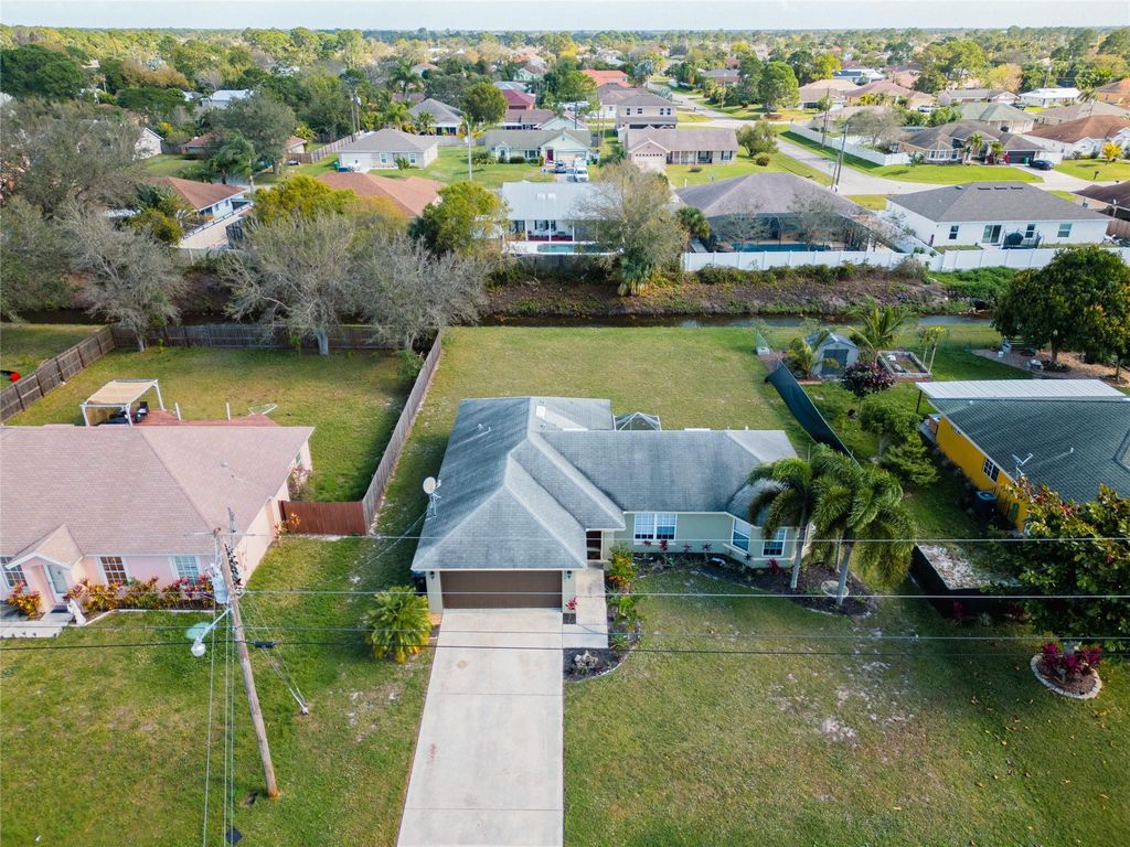 Photo of 3589 SW Kromrey Street, Port Saint Lucie, FL 34953 (MLS # F10444870)