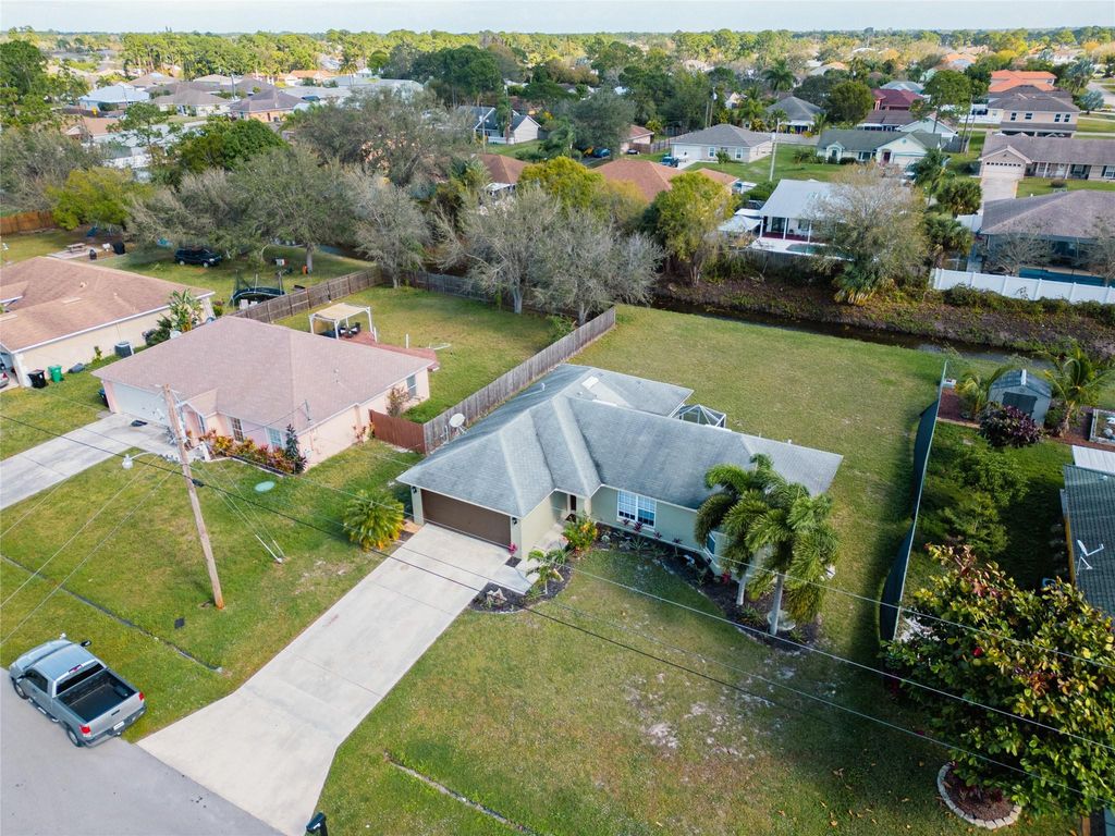 Photo of 3589 SW Kromrey Street, Port Saint Lucie, FL 34953 (MLS # F10444870)