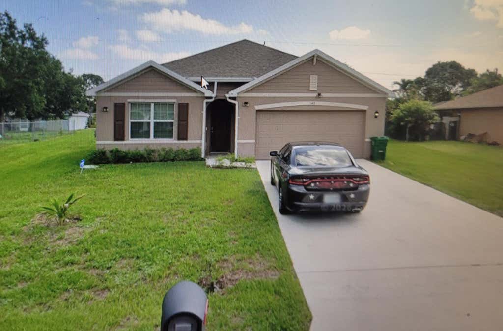 Photo of 149 SW COVINGTON Road, Port Saint Lucie, FL 34953 (MLS # B26055305)