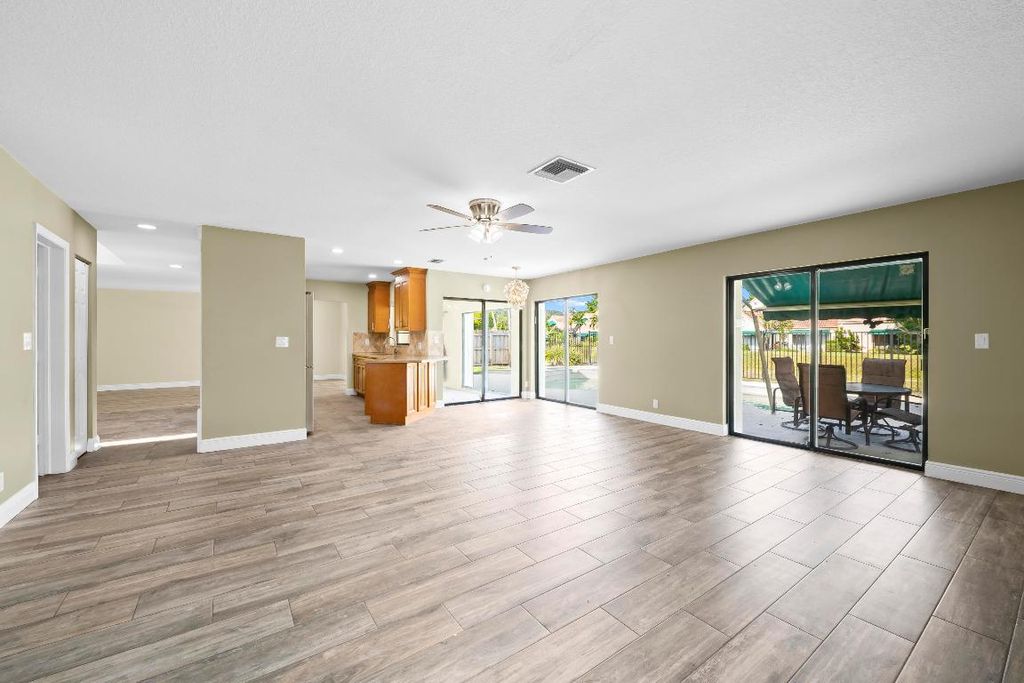 Photo of 6361 Hollandaire Drive E, Boca Raton, FL 33433 (MLS # R11142968)