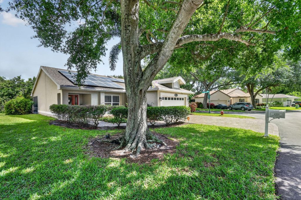 Photo of 4200 Grove Park Lane, Boynton Beach, FL 33436 (MLS # B26024700)