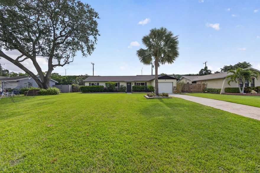 Charming 3-Bedroom, 2-Bath Home in Desirable Palm Beach Gardens. Welcome to this delightful home that sits on an expansive lot featuring lush, manicured landscaping.Recent upgrades include a newer roof and hurricane-impact windows and doors, offering peace of mind and protection. The property boasts a sparkling pool perfect for Florida living, garage, fully fenced backyard ideal for privacy and outdoor entertaining. An automatic sprinkler system . Best of all, there's no HOA, giving you complete freedom and flexibility!The home's prime location provides convenient access to shopping, dining, entertainment, top-rated schools. With solid bones and hurricane protection upgrades already in place, this property offers an excellent opportunity to remodel and create your dream Florida home.