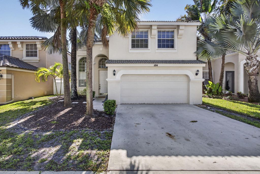 Photo of 1104 Oakwater Drive, Royal Palm Beach, FL 33411 (MLS # B26027150)