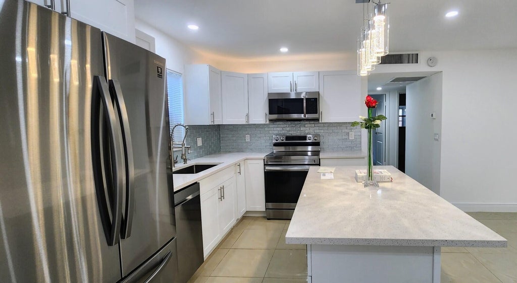 Photo of 153 Monaco D #D, Delray Beach, FL 33446 (MLS # R10916748)