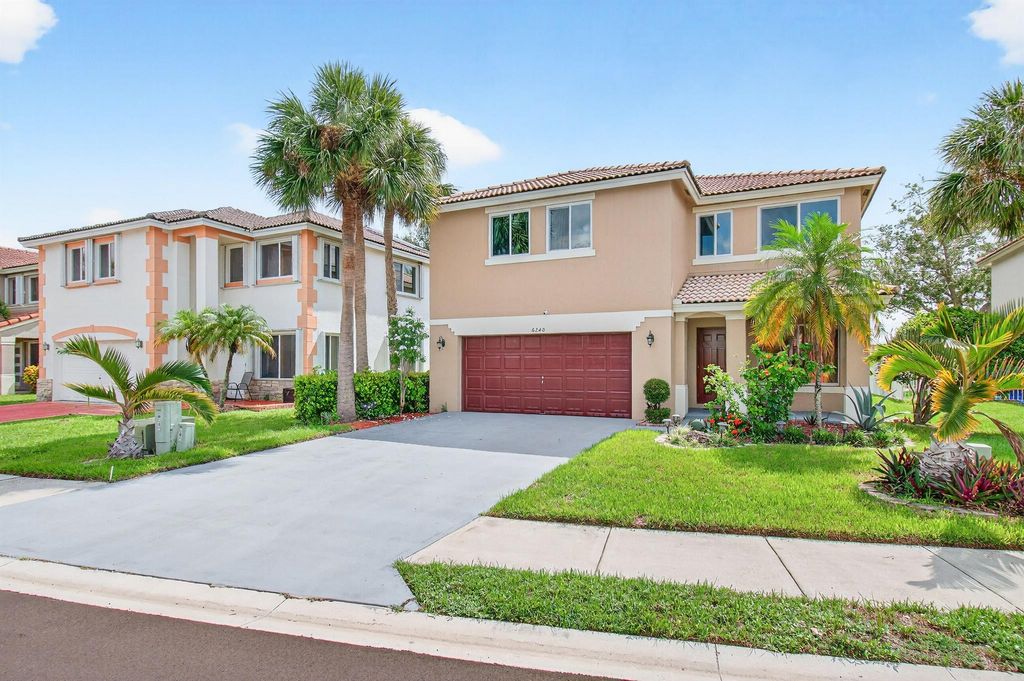 Photo of 6240 NW 41st Terrace, Coconut Creek, FL 33073 (MLS # R11121012)