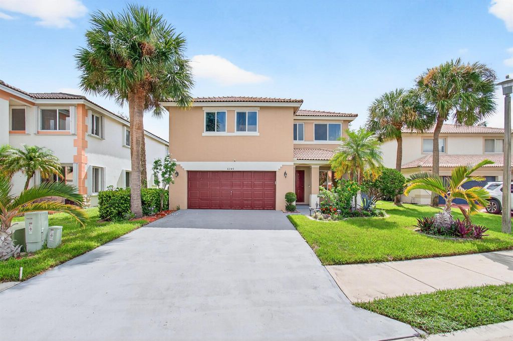 Photo of 6240 NW 41st Terrace, Coconut Creek, FL 33073 (MLS # R11121012)