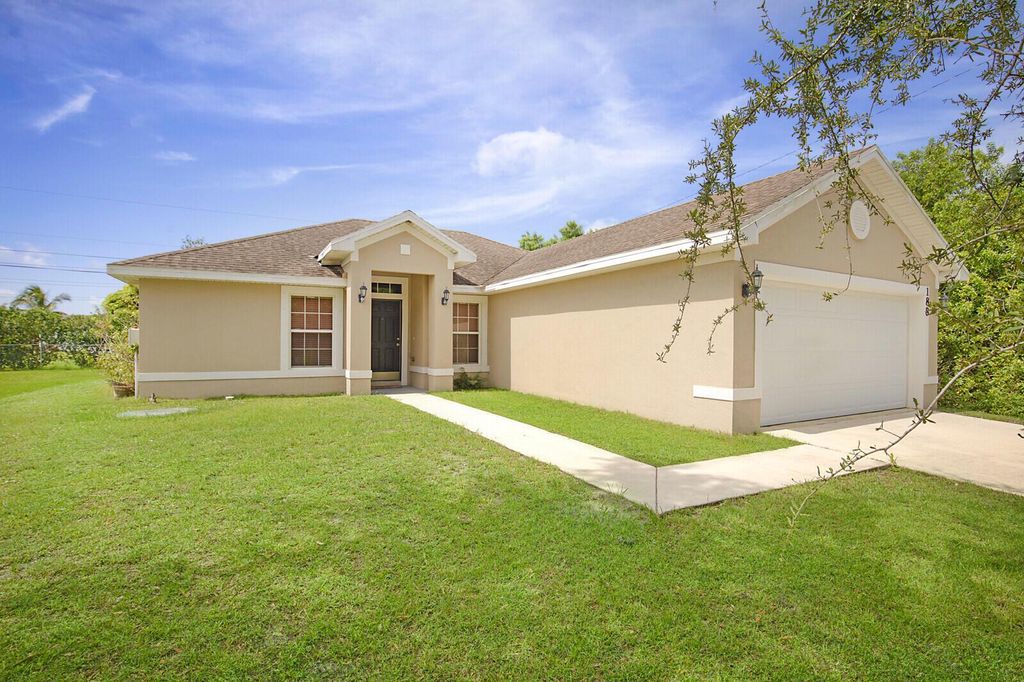 Photo of 188 SW Sea Lion Road, Port St Lucie, FL 34953 (MLS # R10904440)