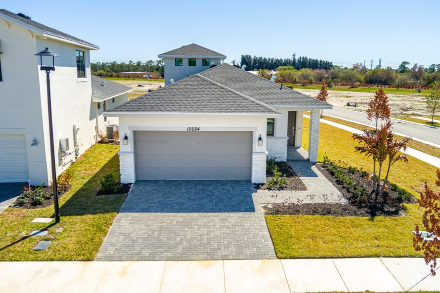 This new two-story home is perfect for entertaining with a convenient bonus room on the second level. On the first floor, an inviting open-concept layout blends the kitchen, living and dining areas, with easy access to a nearby covered porch. All three bedrooms are tucked away to the side for optimal comfort and privacy, including a lavish owner's suite at the back of the home with a full bathroom and walk-in closet.

Prices, dimensions and features may vary and are subject to change. Photos are for illustrative purposes only.