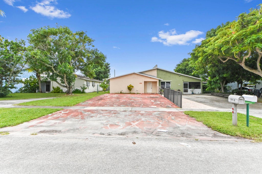 Photo of 5918 S Rue Road, West Palm Beach, FL 33415 (MLS # B26091809)