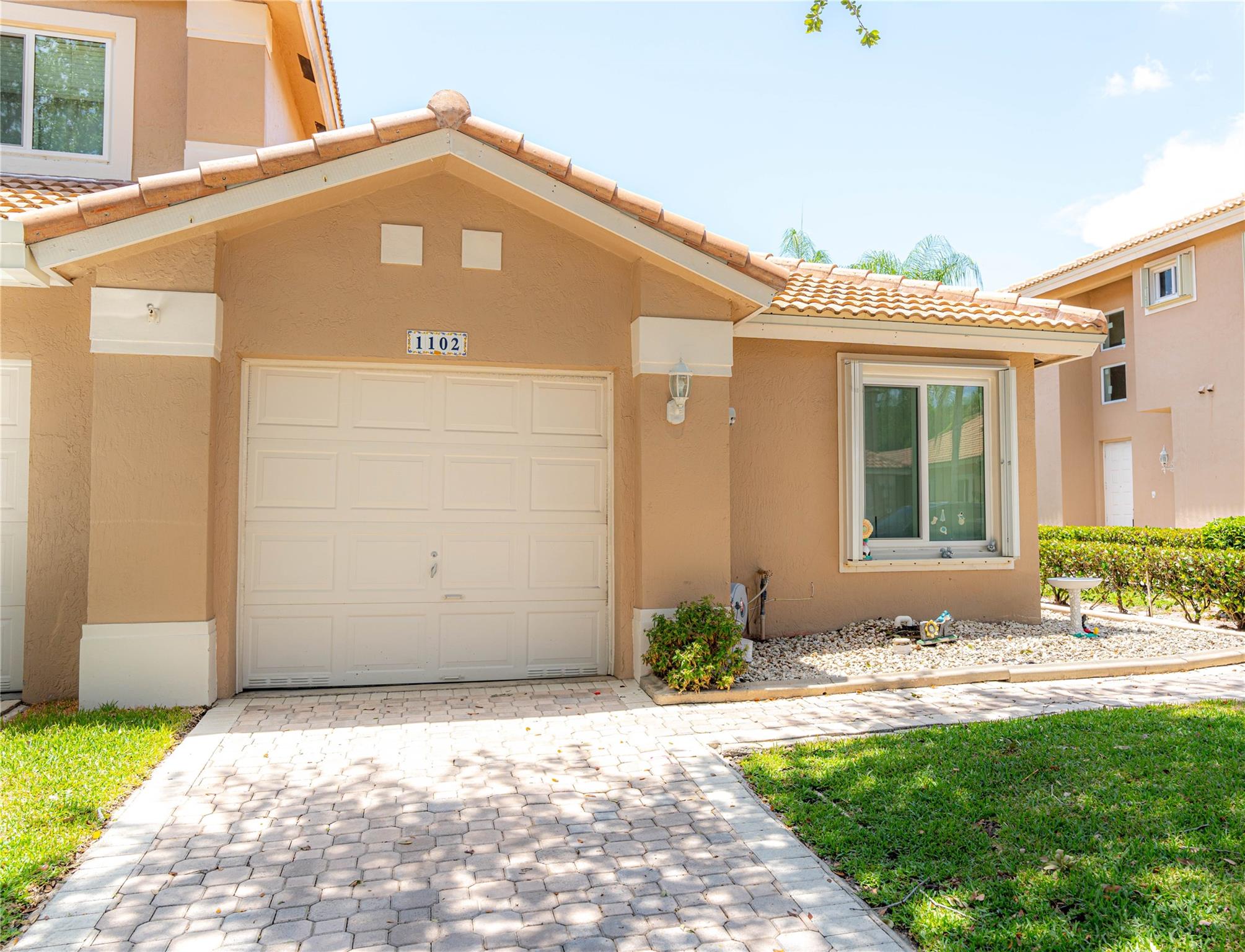 Welcome to your dream home in the beautiful Grand Palms Golf Community! A spacious one story beautifully updated 3-bedroom 2-bath house located in the highly desirable Grand Palms Neighborhood. The house features a renovated kitchen, updated bathrooms, newer flooring, custom built-in closets, and is freshly painted throughout! Newer roof installed in 2023 and AC in 2019. Hurricane impact windows throughout as well as a private screened in patio. The HOA includes WIFI, Roof, HD Cable, Pool, Security, Lawn Care and more! This turnkey house is perfect for a family that wants to move in and enjoy their home on day one! A great location in Pembroke Pines close to great schools, shopping, and a hospital, all while nestled into a quiet private neighborhood.