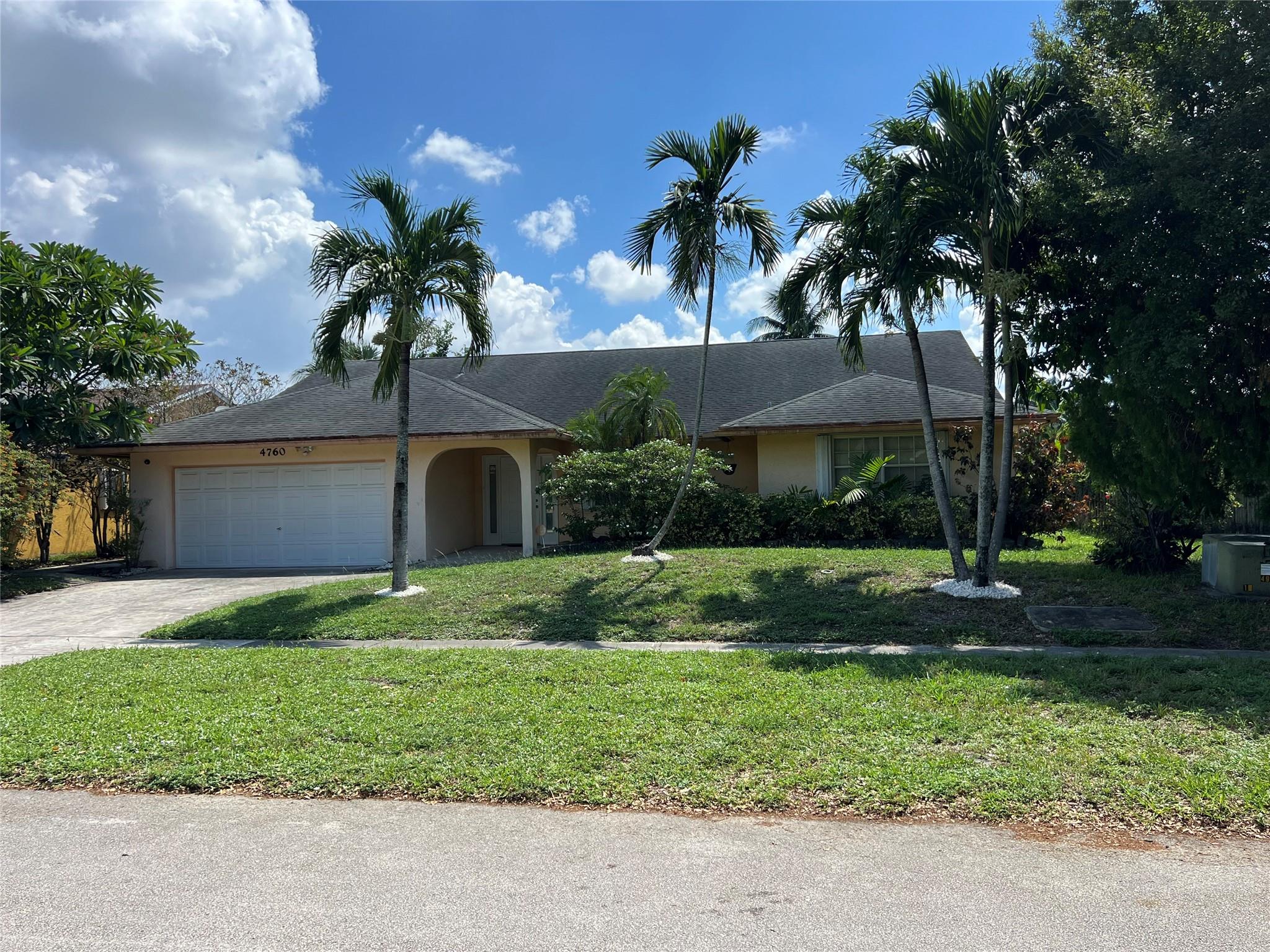 Welcome to your new LAKEFRONT HOME in the desirable INVERRARY COMMUNITY! This 4-bedroom, 2.5-bath residence features a private pool, 2-car garage, and spacious split floor plan. Bright and open with vaulted ceilings, tile and laminate floors throughout. The kitchen offers stainless steel appliances, granite countertops, and plenty of cabinetry, flowing into the main living area with pool views. Outside, enjoy a screened patio, fenced yard, sparkling pool, and covered lounge area—perfect for relaxing or entertaining. Laundry in garage with large driveway for extra parking. Centrally located near parks, schools, shopping, and major highways. MAKE THIS YOUR HOME!