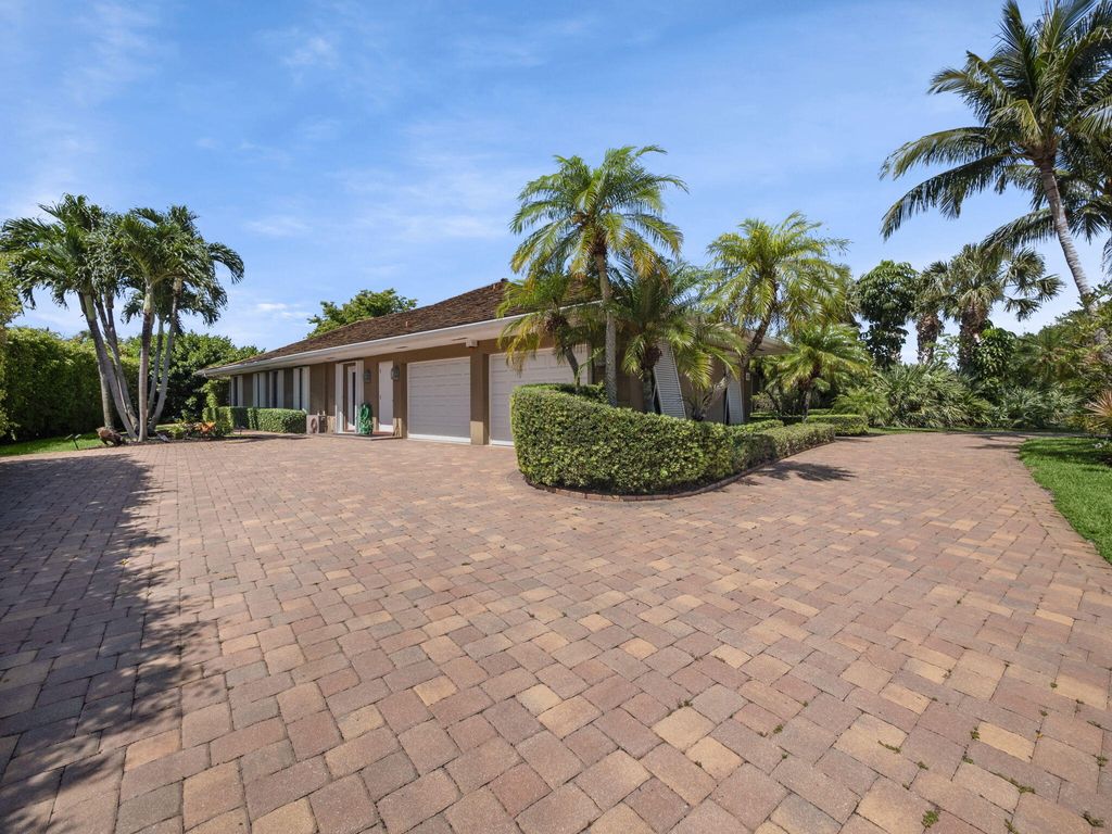 Photo of 335 Glenbrook Drive, Atlantis, FL 33462 (MLS # R10990244)