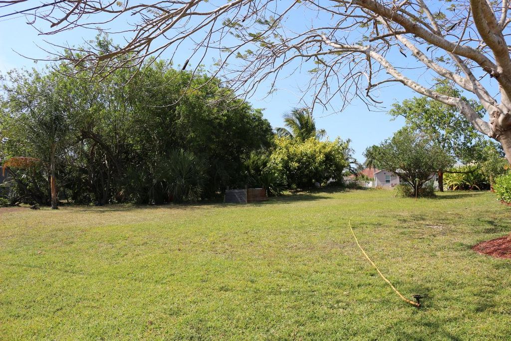 Photo of 525 SW Feldman Avenue, Port Saint Lucie, FL 34953 (MLS # R10979814)