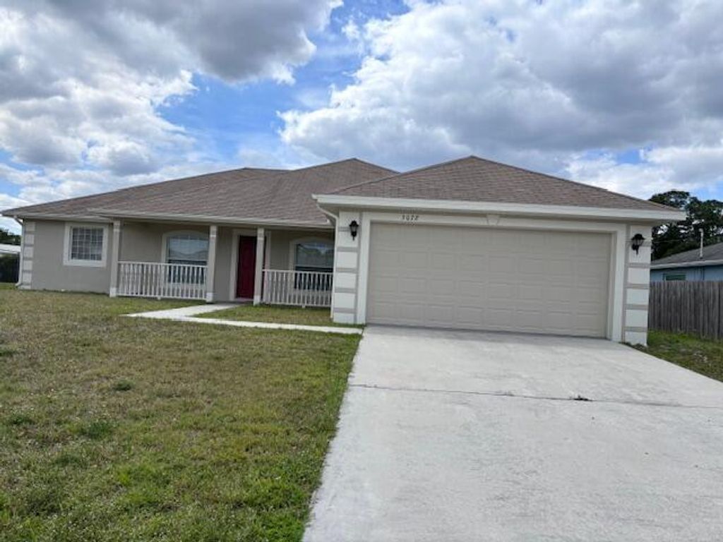 Photo of 3072 SW Circle Street, Port Saint Lucie, FL 34953 (MLS # R10973867)