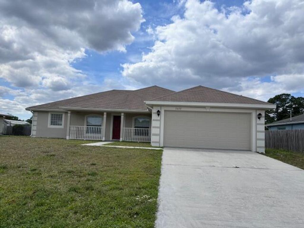Photo of 3072 SW Circle Street, Port Saint Lucie, FL 34953 (MLS # R10973867)