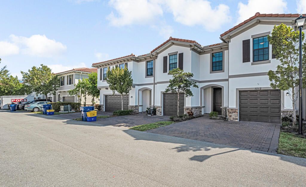 Photo of 1012 Willow Place, Riviera Beach, FL 33410 (MLS # R11073973)