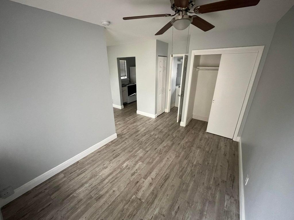 Photo of 1150 W Blue Heron Blvd #7, Riviera Beach, FL 33404 (MLS # R11167095)