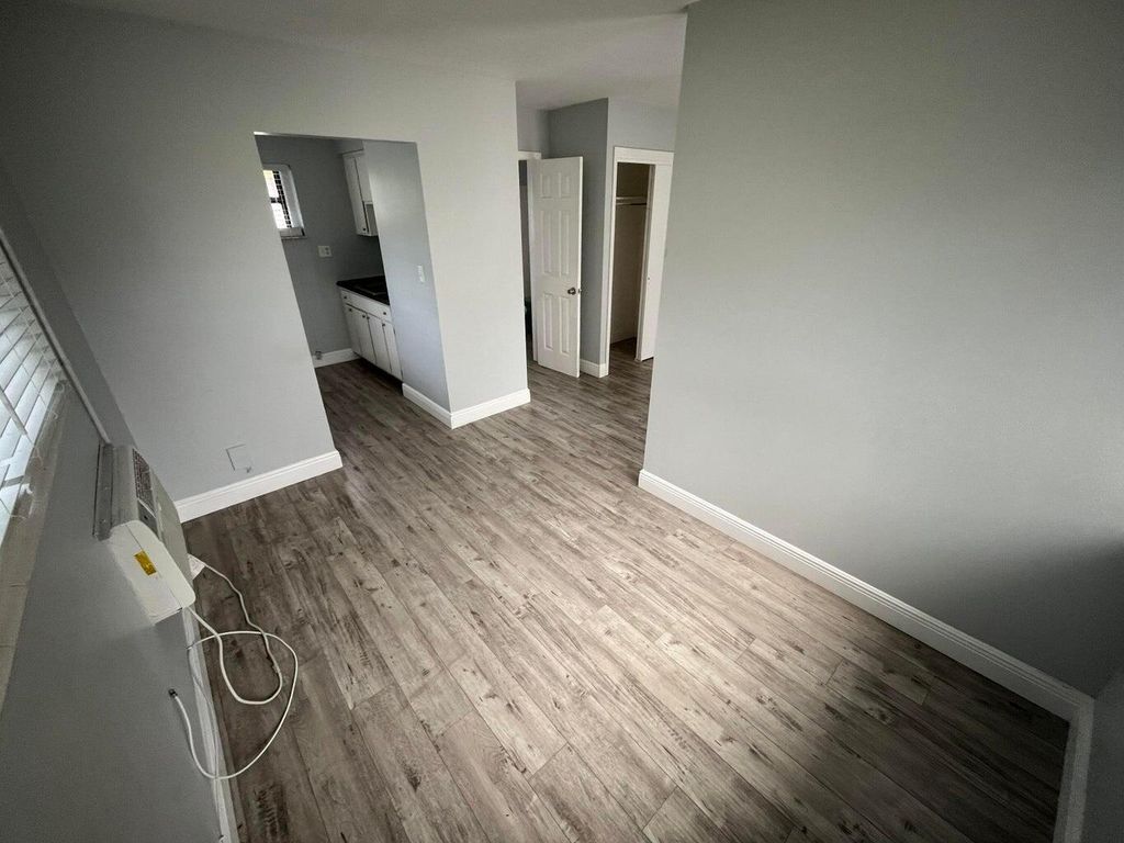 Photo of 1150 W Blue Heron Blvd #7, Riviera Beach, FL 33404 (MLS # R11167095)