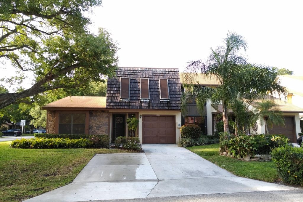 Photo of 1082 Raintree Lane, Palm Beach Gardens, FL 33410 (MLS # R10770109)