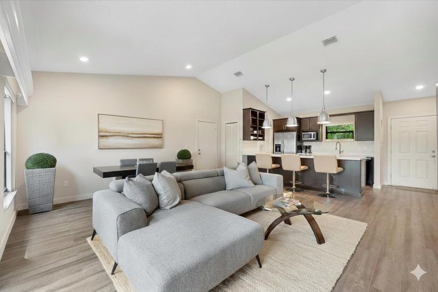 The perfect little spot, whether for yourself or as an investment. This unit has everything you need-impact windows and sliders, a pond view, and is walking distance to the community pool, tennis, 2 restaurants, and fitness center. Located within the gates of prestigious Palm Beach Polo Club, this unit is just minutes from WEF, Global Dressage, and all shops and restaurants. It is also only 20 minutes from downtown WPB and 30 minutes to Palm Beach. Live on one side and rent the other!