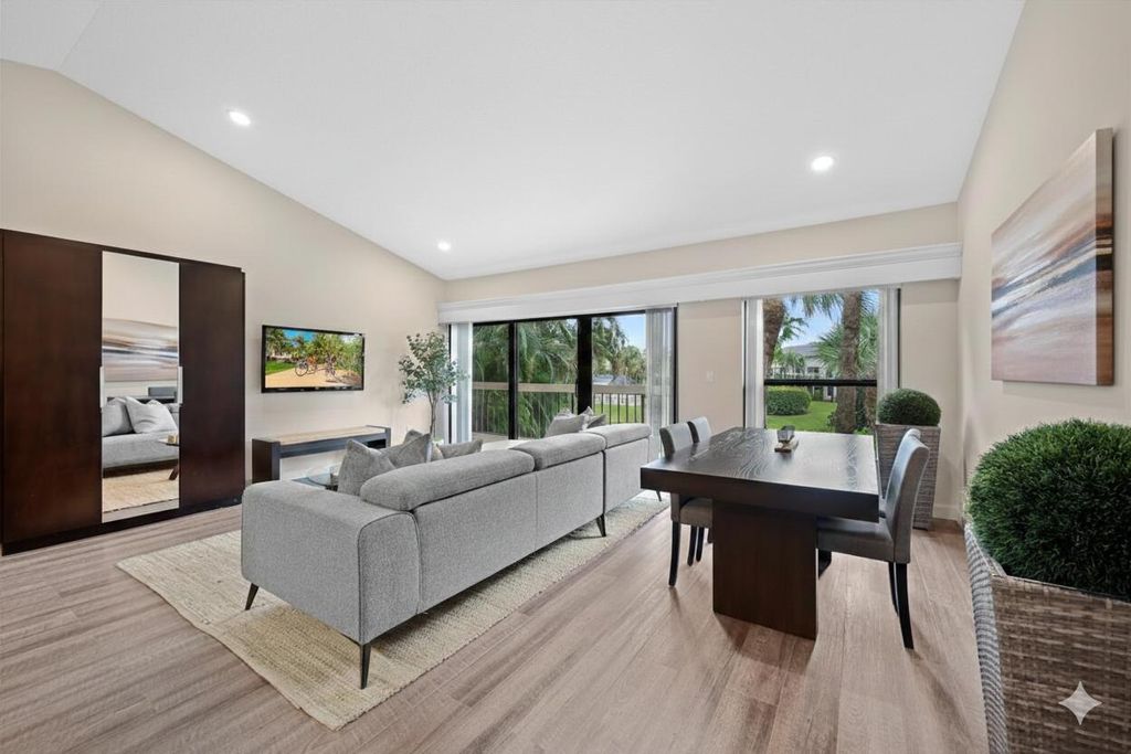 Photo of 11863 Wimbledon Circle #542, Wellington, FL 33414 (MLS # R11165893)