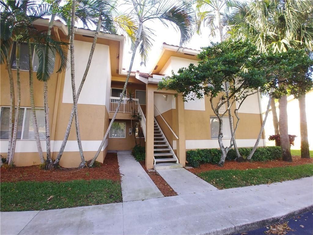 Photo of 705 NW 91st Terrace, Plantation, FL 33324 (MLS # F10552186)