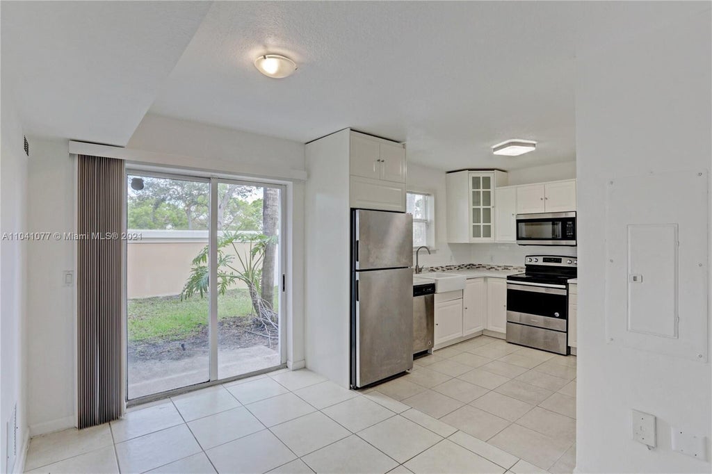 Photo of 3810 N JOG Road #106, West Palm Beach, FL 33411 (MLS # B26080435)
