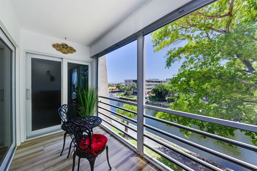 Move-in ready luxury on the water your turnkey paradise awaits! This beautifully renovated and fully furnished 2-bedroom, 2-bath en-suite condo is ideally located just minutes from Downtown Boca Raton, Mizner Park, Delray Beach, and the ocean. Enjoy modern upgrades throughout, including hurricane-impact windows, a custom master closet, a granite kitchen with cherry oak cabinetry, stainless steel appliances, and elegant porcelain wood-look floors. Relax by the waterfront pool or take advantage of the community dock, the perfect blend of lifestyle and investment potential!