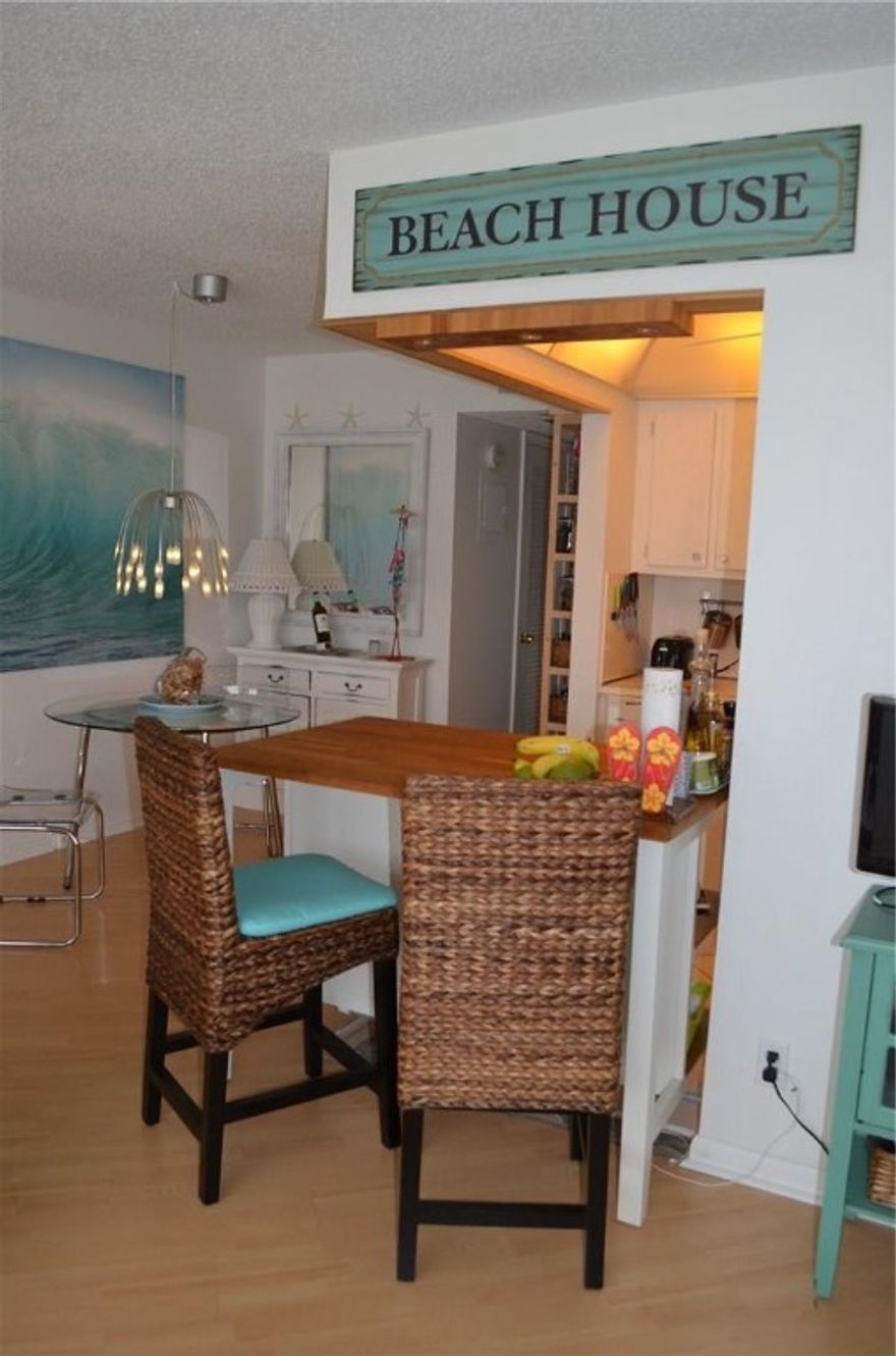 Amazing condo located in the sought-after gated community of Century Village. This unit has been tastefully remodeled/furnished and is sold all furnished! Peaceful water views from the Florida room and nice flooring throughout the unit. Come visit while it last!