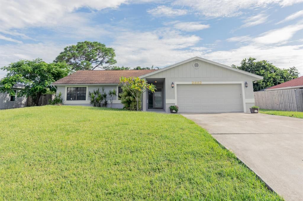 Photo of 2662 SE Brevard Avenue, Port Saint Lucie, FL 34952 (MLS # R10745384)