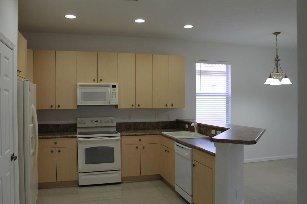 Photo of 1804 SW Jamesport Drive, Port Saint Lucie, FL 34953 (MLS # B26005893)