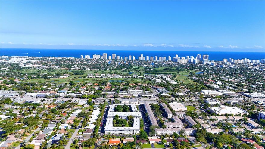 Experience true South Florida living in this 2BR/2BA corner condo located near Coral Ridge Country Club, just off N Federal Highway! This second-floor unit offers just under 1,000 sqft with hurricane impact windows and doors, a screened-in balcony overlooking the peaceful courtyard, and an open floor plan. The community features a beautiful pool, community room, and well-maintained common areas ideal for relaxing or socializing. Enjoy being close to it all, shopping, dining, and everyday conveniences are just minutes away, with Ft Lauderdale Beach less than 10 minutes and the airport just 20 minutes from your door. Whether commuting, exploring, or simply enjoying the coastal lifestyle, this location offers the perfect mix of comfort and affordability in a highly sought after neighborhood!
