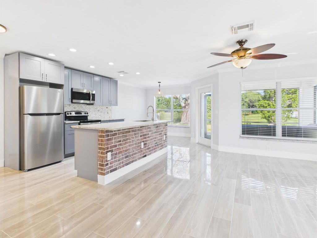 Photo of 1014 Fosters Mill Road, Boynton Beach, FL 33436 (MLS # R11084958)