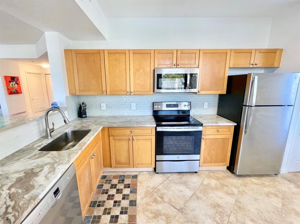 Photo of 11037 Legacy Boulevard #101, Palm Beach Gardens, FL 33410 (MLS # R10708395)