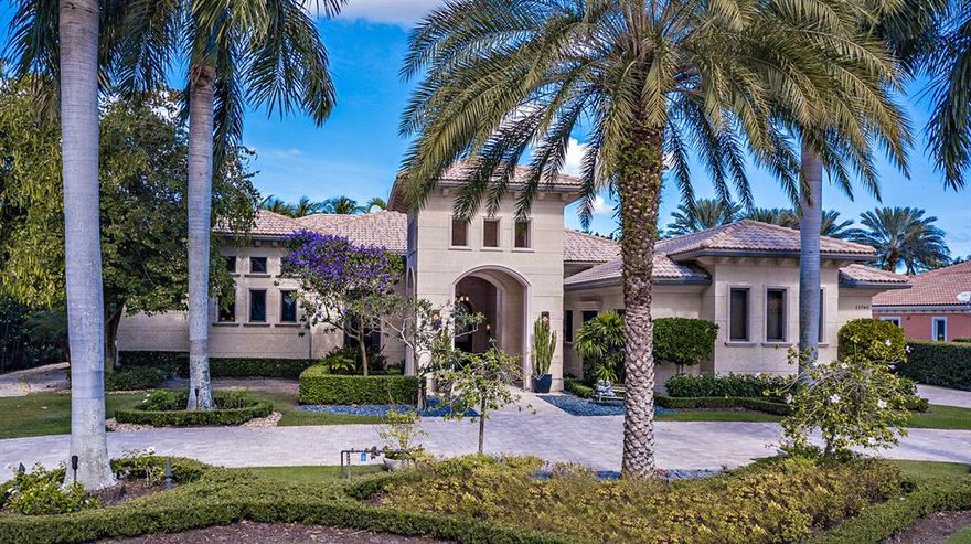 Beautifully appointed custom home located in the Grand Estate neighborhood of Old Palm Golf Club. This four bedroom home boasts the finest craftsmanship. Offered beautifully furnished. Private 1/2 Acre homesite. Grand vaulted ceilings with box beams and coffers.  Very spacious master bedroom w/his/hers elegant bathrooms & dressing rooms. Wine enthusiasts will enjoy the custom climate controlled wine wall. Movie buffs will enjoy the 9 seat home theatre. Step outside to your private oasis including a picturesque pool and spa with a large covered loggia complete with outdoor kitchen. You will enjoy private living along with a range of first-class amenities in one of the world's most exclusive golf club communities.