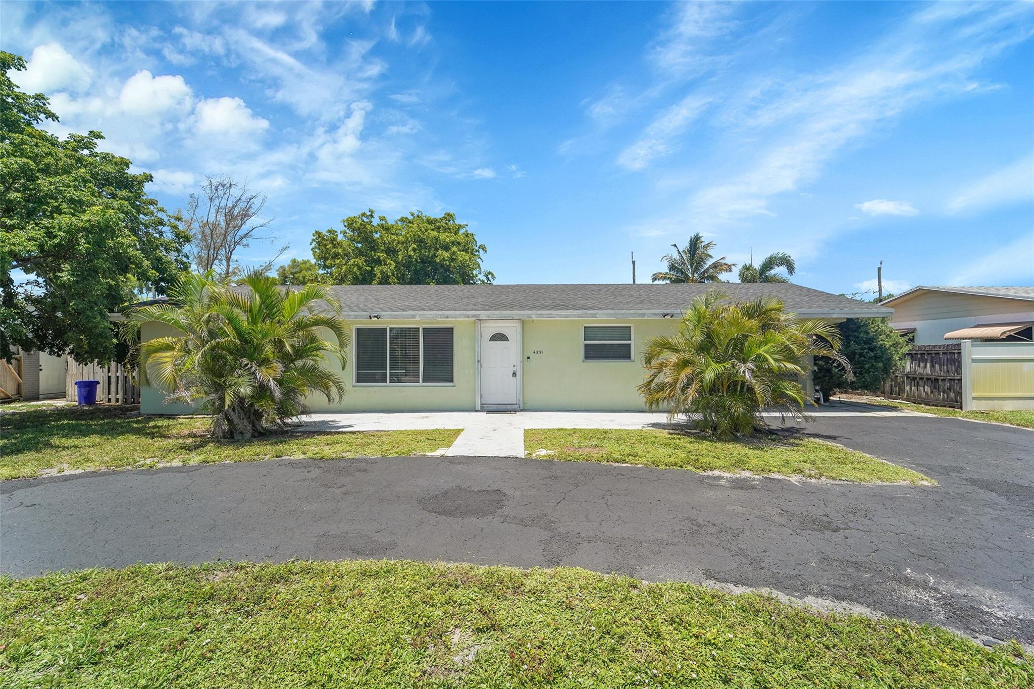 Welcome home to this hidden gem of a home on a quiet neighborhood street. New roof and impact windows in 2022. Huge private, fenced in backyard with nearly 14,000 sq. feet to roam. Private pool, tons of extra storage, plus a quaint gardening shed at the back. Lots of natural light. An extended Florida room off your covered patio make this the ideal home for all. Recently refurbish terrazzo and tiled floors, kitchen and baths. Separate inside laundry room. Freshly painted throughout. Lots of space to roam. Circular driveway and carport make room for plenty of cars. Excellent location. Convenient to so many things, shopping, schools, houses of worship, beautiful parks and waterways, and much more. Make this one your next place to call home. There's nothing else like it in the area.