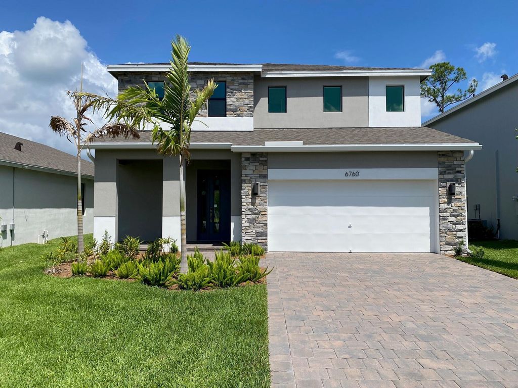 Photo of 6760 SE Park Trace Drive, Stuart, FL 34997 (MLS # R11037117)