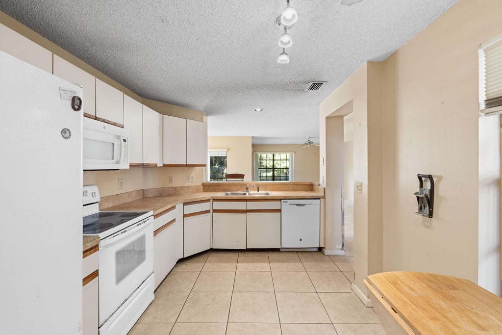 Photo of 3237 Perimeter Drive #2512, Greenacres, FL 33467 (MLS # B26075725)