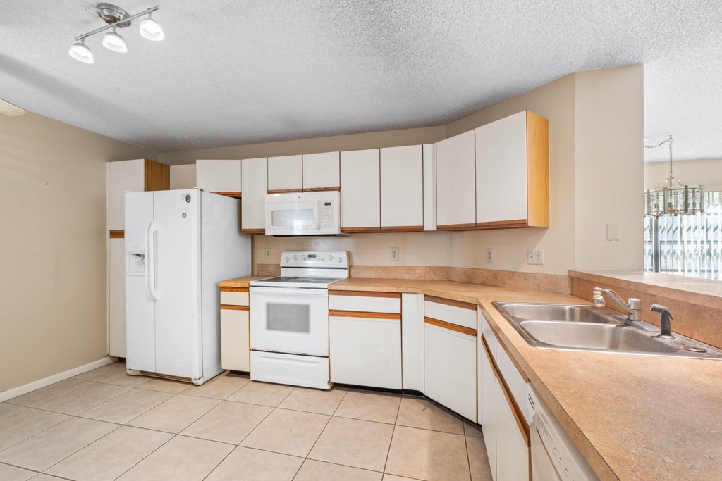 Photo of 3237 Perimeter Drive #2512, Greenacres, FL 33467 (MLS # B26075725)