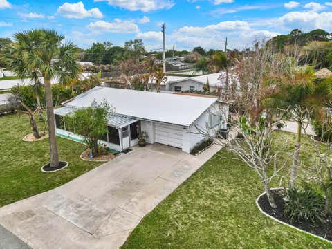Photo of 1180 NE Crescent Street, Jensen Beach, FL 34957 (MLS # B26001214)