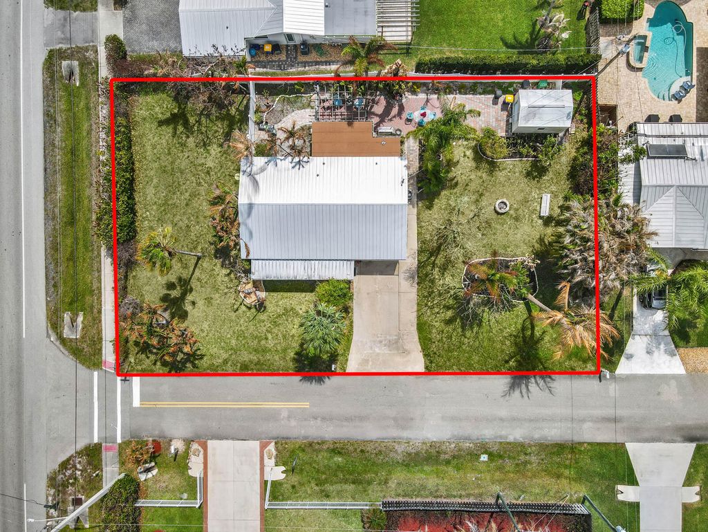 Photo of 1180 NE Crescent Street, Jensen Beach, FL 34957 (MLS # B26001214)