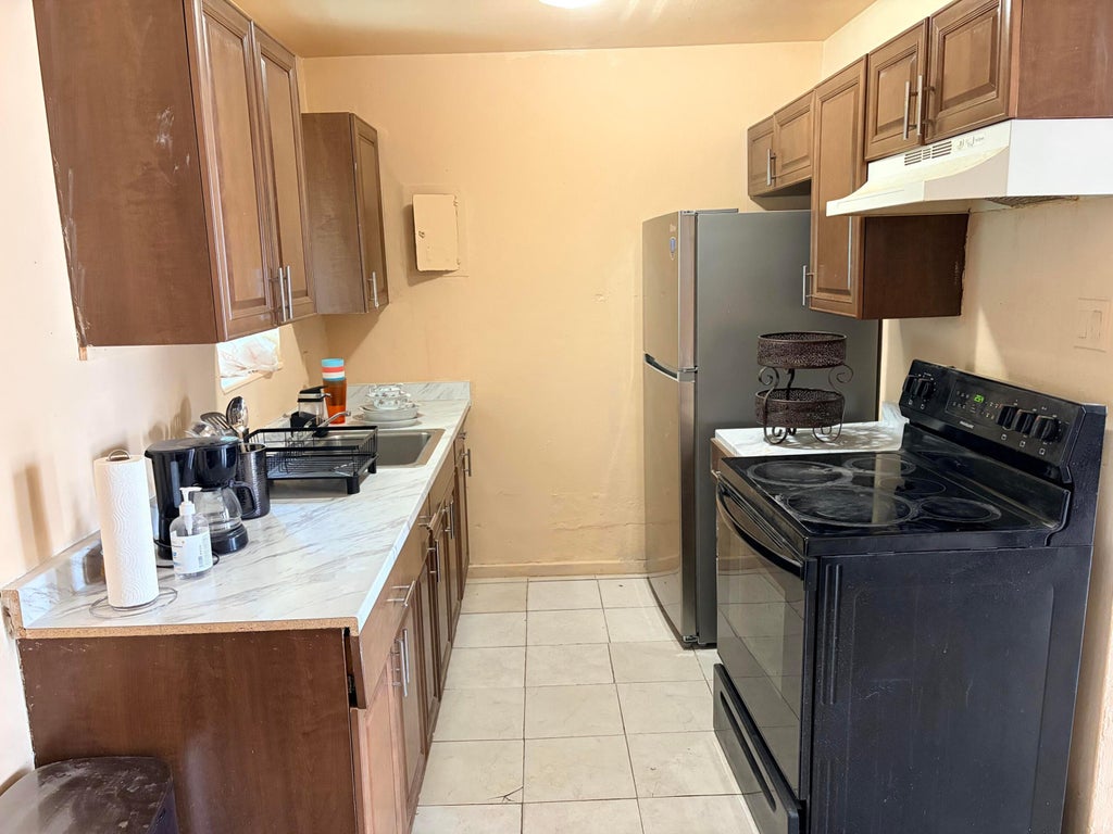 Photo of 2033 Longwood Road, West Palm Beach, FL 33409 (MLS # B26050580)