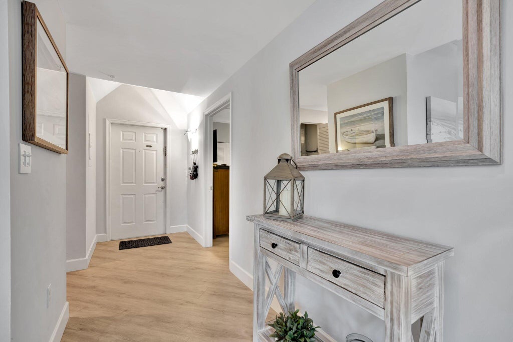 Photo of 400 Uno Lago Drive #105, Juno Beach, FL 33408 (MLS # R11106418)