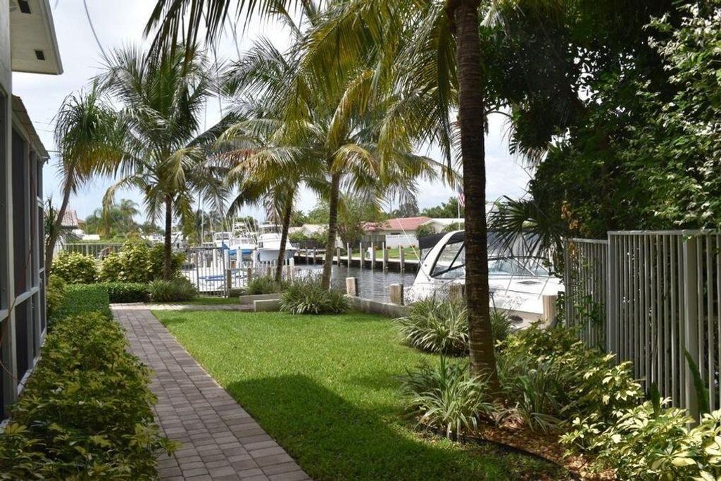 Photo of 1361 NE 27 Way, Pompano Beach, FL (MLS # B26025157)