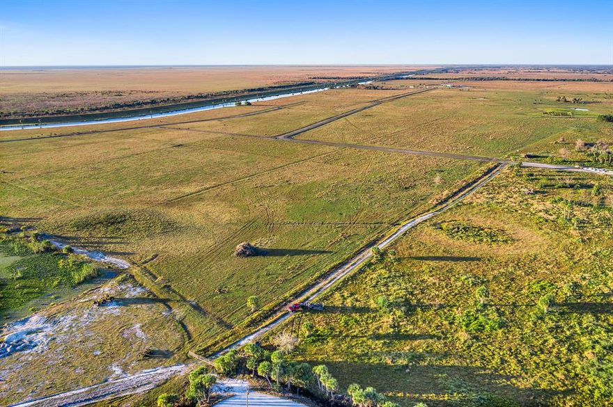 Shovel ready and fully permitted development project located on Lake Okeechobee FL. 531 acres consisting of 490 one half acre lots, 81 lots directly on the waterway which surrounds Lake Okeechobee, 75 lots on inland lakes, and includes 40 acres of commercial approved buffer along SR-78. This beautiful location is poised for development and recently attracted the new Bass Pro Resort which is being built within a few miles. Come and enjoy wide open spaces, world class outdoor lifestyle, and all that the beautiful Sunshine State has to offer! With over one thousand new residents relocating to the state per day this, development will bridge the historically low inventory gap! Welcome to Florida!
