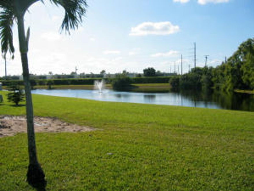 Beautifully Maintained 2/2 Villa With Garage and a Lovely Lake View, allowing Privacy, Peace and Serenity.  Fresh Interior Paint throughout just completed (week of Feb. 16) and New Carpet laid (Feb. 20). Auxiliary Power Generator System just a few years new (only used a few times) and Security Alarm System AND Accordion Hurricane Shutters, Providing Comfort, Security and Peace of Mind. Clearly this place was well taken care of. Storage Closets in Garage. Frigidaire kitchen appliances. Bathroom Shower Tile to ceiling.  Ideal for a snowbird or full time living. Las Verdes has 3 pools, tennis courts, Socials and much much more!! This listing is subject to error, omission and change without notice. All sizes deemed reliable but not guaranteed. All info must be verified by buyer.