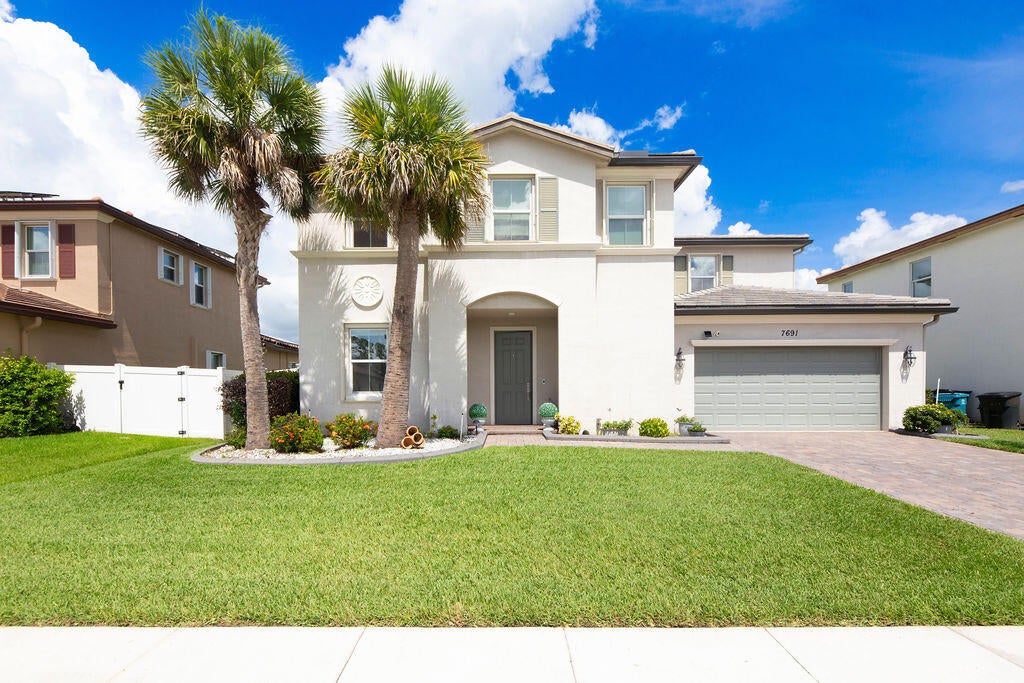Photo of 7691 NW GREENSPRING Street, Port Saint Lucie, FL 34987 (MLS # B26070137)
